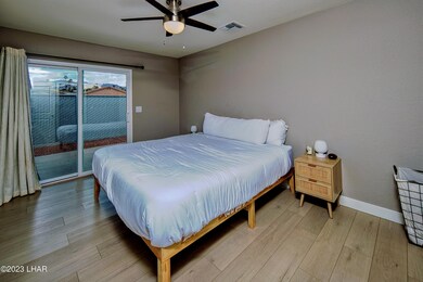 Main Bed has Private Fenced Patio