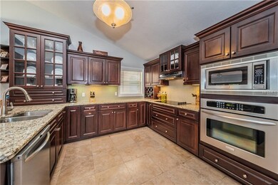 Stunning kitchen with granite counters, stainless 