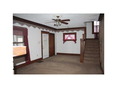 Family Room. Family room and the open stair way le