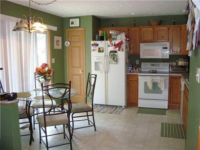 Kitchen. Kitchen area with sliding glass doors going out onto the fantastic deck!!