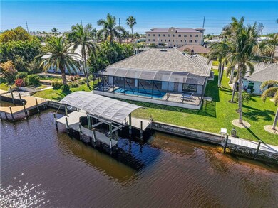 Dock area featuring an outdoor pool, a water view,