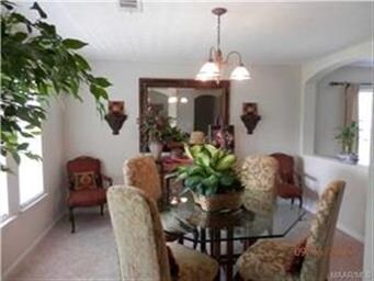 Formal Dining Room features two open arches.  This