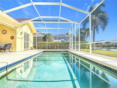 View of swimming pool with glass enclosure, a wate