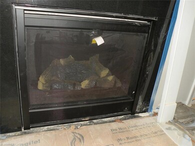Fireplace w/ Gas Logs in LR