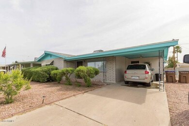 Front with Carport