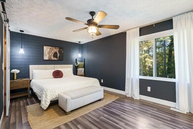 The Primary Suite feels like a true escape with a Fireplace of Its Own, a stylish Accent Wall, and a Spa-Inspired Ensuite Bath