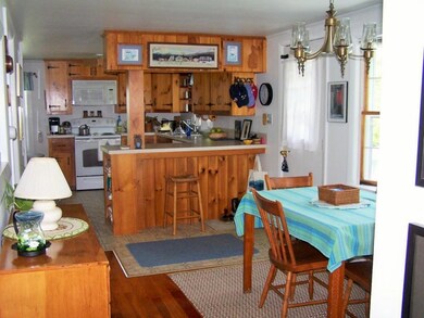 Looking from the hall to the kitchen