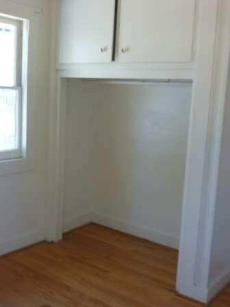 2nd bedroom with nice wood floors.  Windows open a