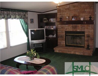 Living Room. Living room has built in bookshleves 
