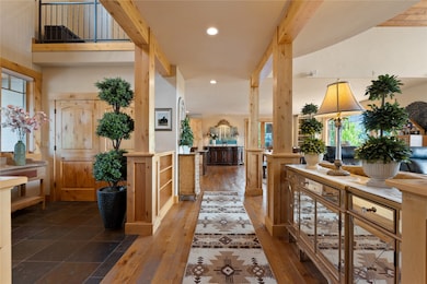 Impressive wood columns with built in cabinetry