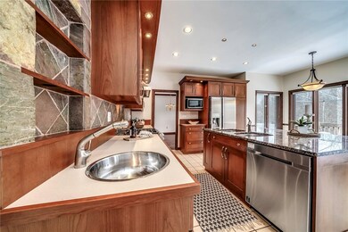 Spacious, gourmet kitchen with ceramic tile floori