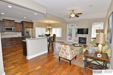 Cozy  up and enjoy watching TV by the fireplace