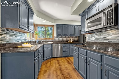 Kitchen with granite counters