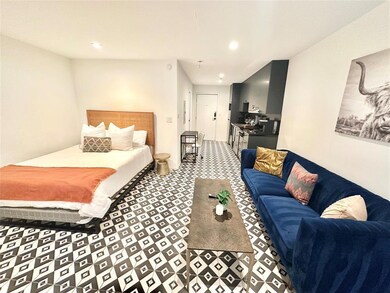 Bedroom featuring recessed lighting