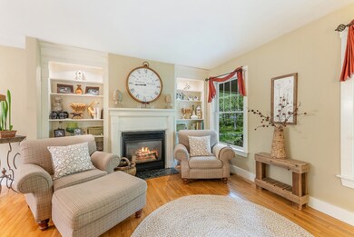 Main living room with gas fireplace.