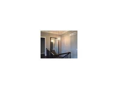 Mirror on the stair landing.
