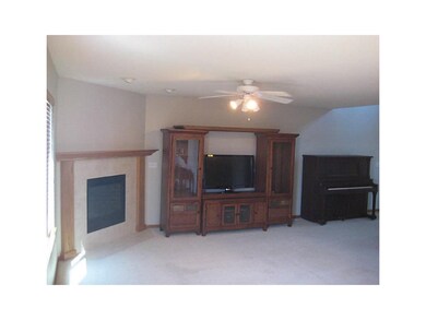 Living Room-L1. Open feeling with gas fireplace.