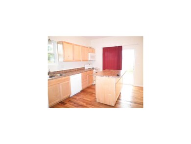 Kitchen. Sliding doors that lead to large deck and