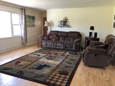 Huge living room with hardwood floors