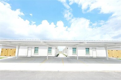 View of front of house with covered parking