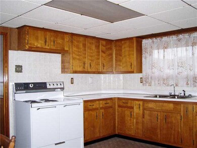 Kitchen. L-Shaped spacious kitchen nice cabinetry,