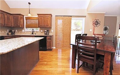 Kitchen with sliding glass door to patio.