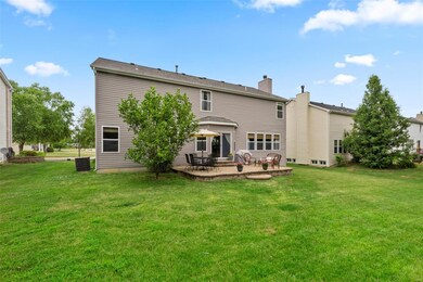 Paver patio and lot backs to tons of trees and overlooks neighbors open backyard.