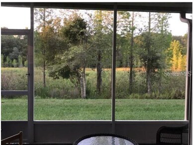 Screened lanai overlooking conservation