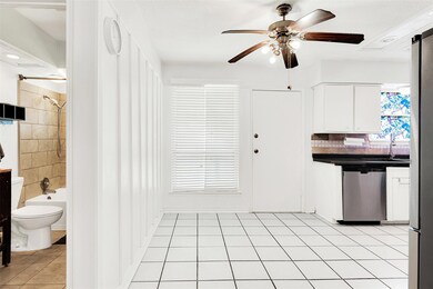 Breakfast room has a large, sunny window, access t