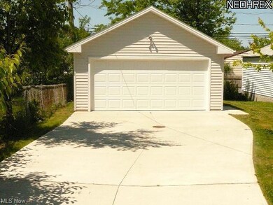 NEWER GARAGE AND DRIVE