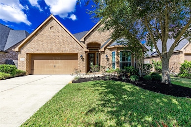 Notice the double wide driveway and the bay window
