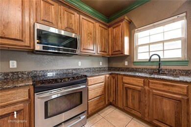 Stainless steel appliances and granite countertops