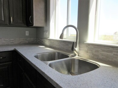Kitchen back splash and Quartz counters