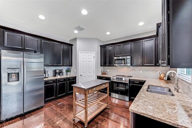 The gourmet kitchen features 42