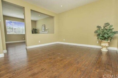 Enter into the living room, notice the detailed ha