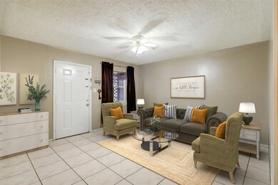 **VIRTUALLY STAGED** Upon entering the home, enjoy a living/dining room combo.