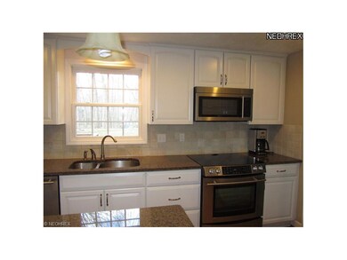 Note the bright window over the sink, which has de