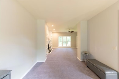 Hallway featuring recessed lighting, carpet floori