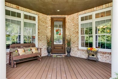 Covered front porch with beaded ceiling.