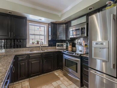Renovated kitchen with granite...