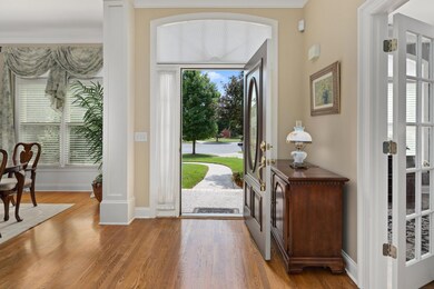 Welcome in to the open floor plan with gleaming sand and finish hardwoods.