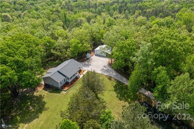 Property includes a 2-car garage/workshop.