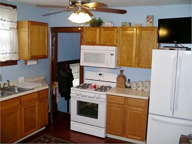 Kitchen. Gas stove and french door refrigerator.
