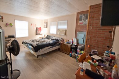 A large master bedroom is 15' x 12'