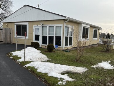Enclosed front porch and new driveway