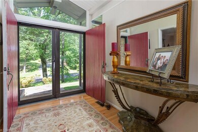 Lovely entry to home! Large double doors enter you to a bright entry with tall ceilings.