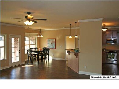 GATHERING ROOM WITH STACKED STONE GAS FIREPLACE