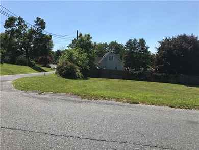 CORNER OF LOT WHERE HOME IS TO BE BUILT FACING 2ND