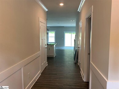 Cove crown molding, craftsman trim and luxury viny