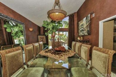 Formal dining room comfortably seats 10 people. 